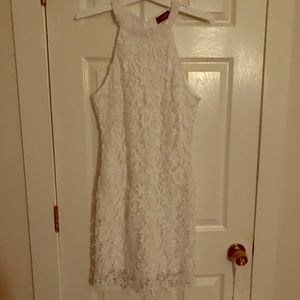 Sleeveless white lace dress